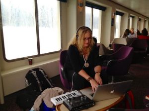 Vicki Hansen composing music on the go